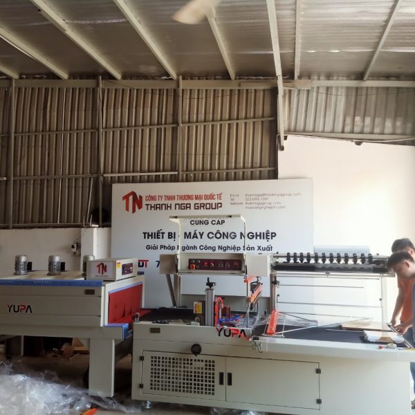 Máy đóng gói co màng ván gỗ xuất khẩu