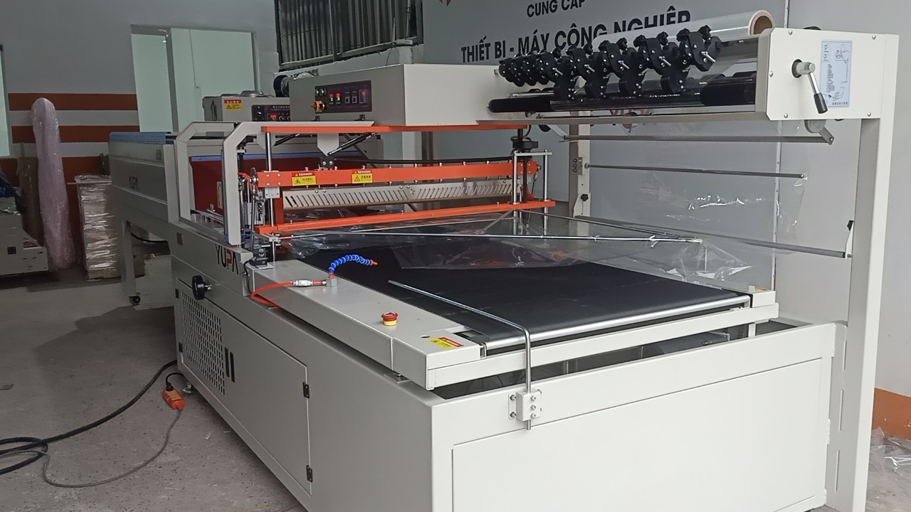 Máy đóng gói co màng ván gỗ xuất khẩu