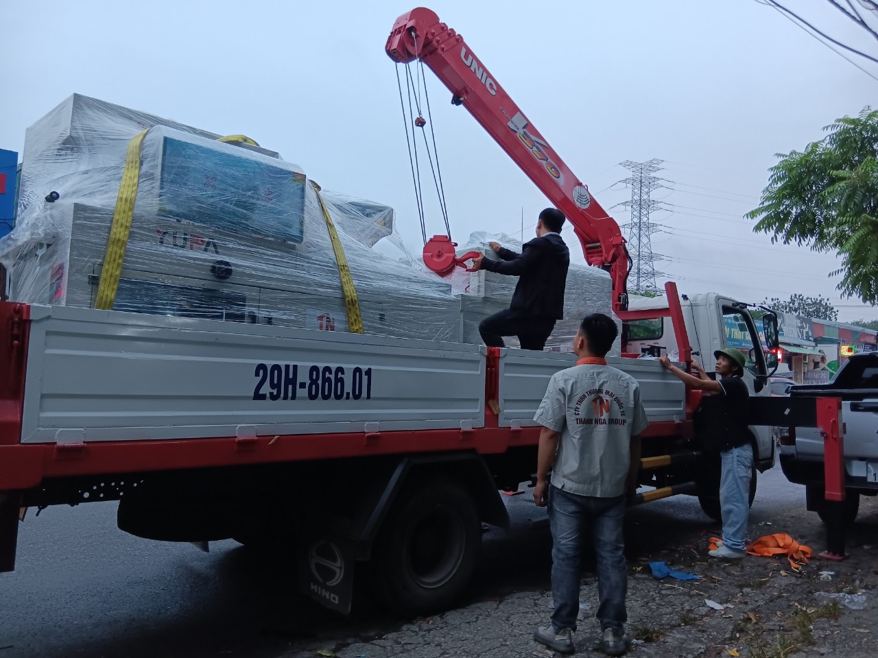 Máy đóng gói co màng ván gỗ xuất khẩu