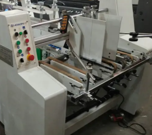 Máy dán hộp carton tự động có móc đáy ZH-1000