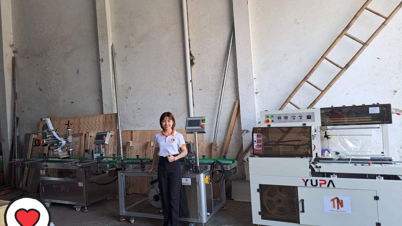 Chuyền máy co màng dán tem hộp tự động