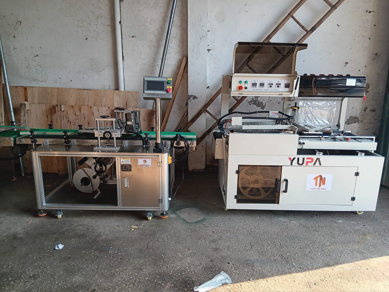 Chuyền máy co màng dán tem hộp tự động